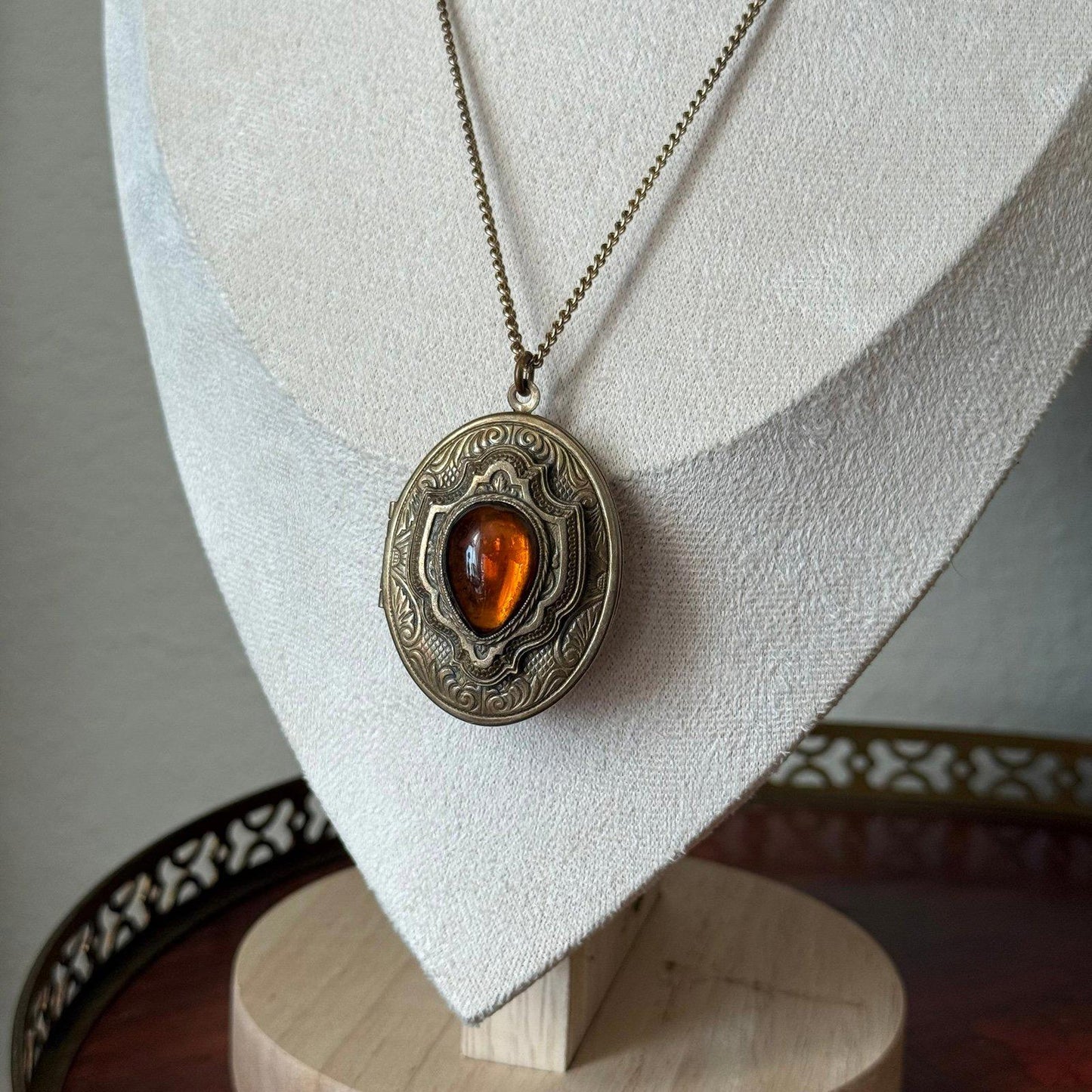 Vintage gold tone locket with glass faux amber Stone necklace