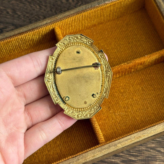 Vintage Gold tone black and white Faux Cameo brooch