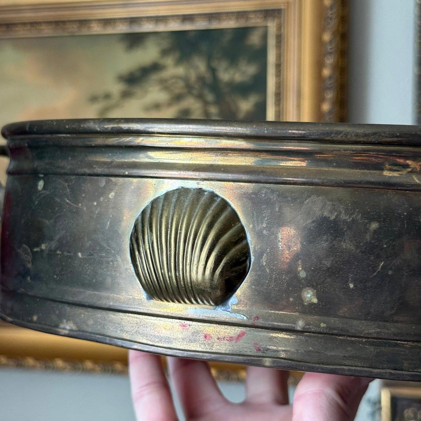 Vintage brass oval planter with a shell design