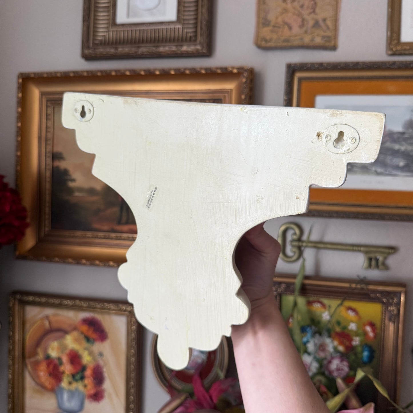 White curved wall sconce