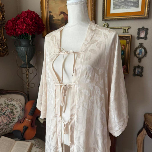 Cream and tan vintage 1970s Coran Noamair long robe with tie front kimono