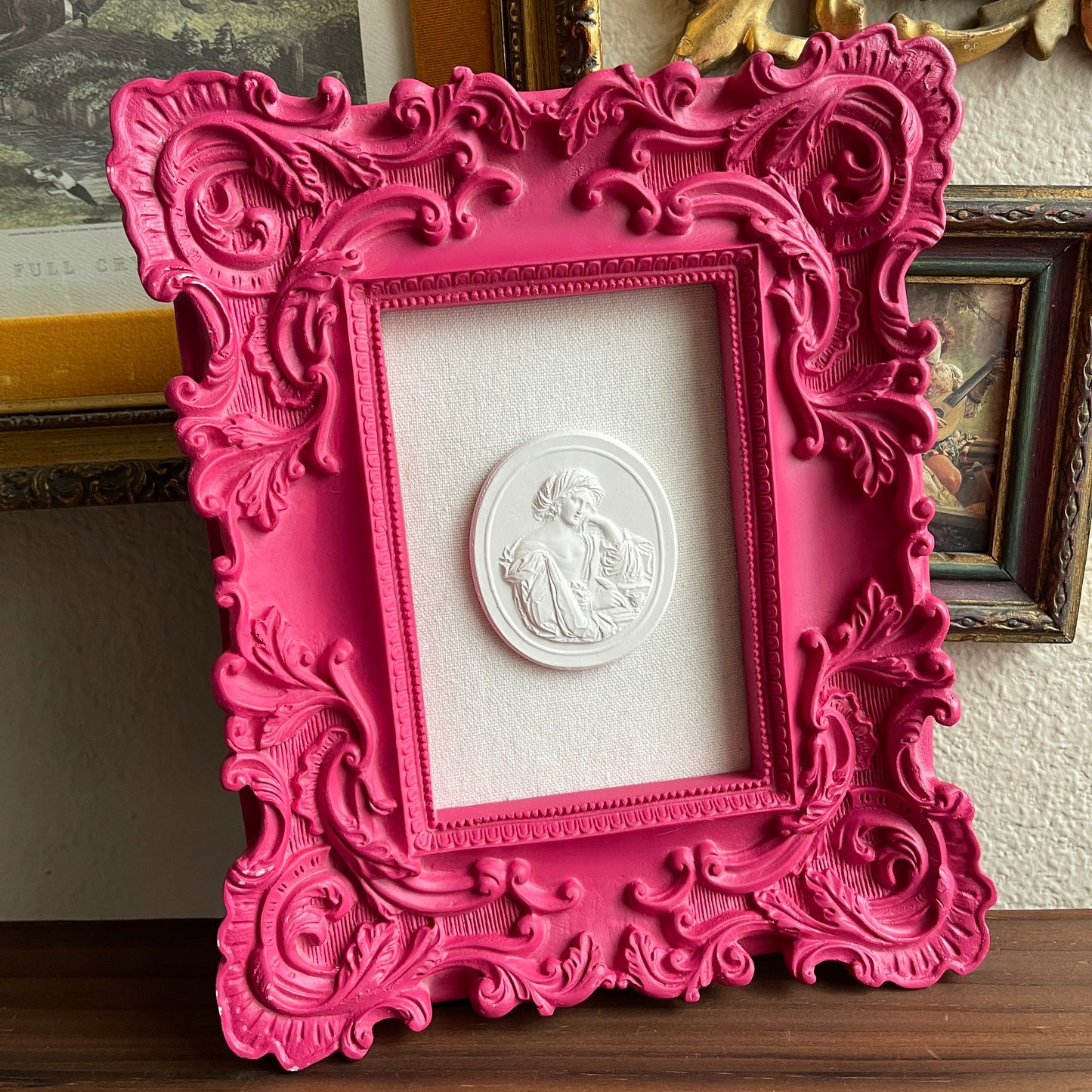 Hot Pink baroque frame with plaster intaglio art piece