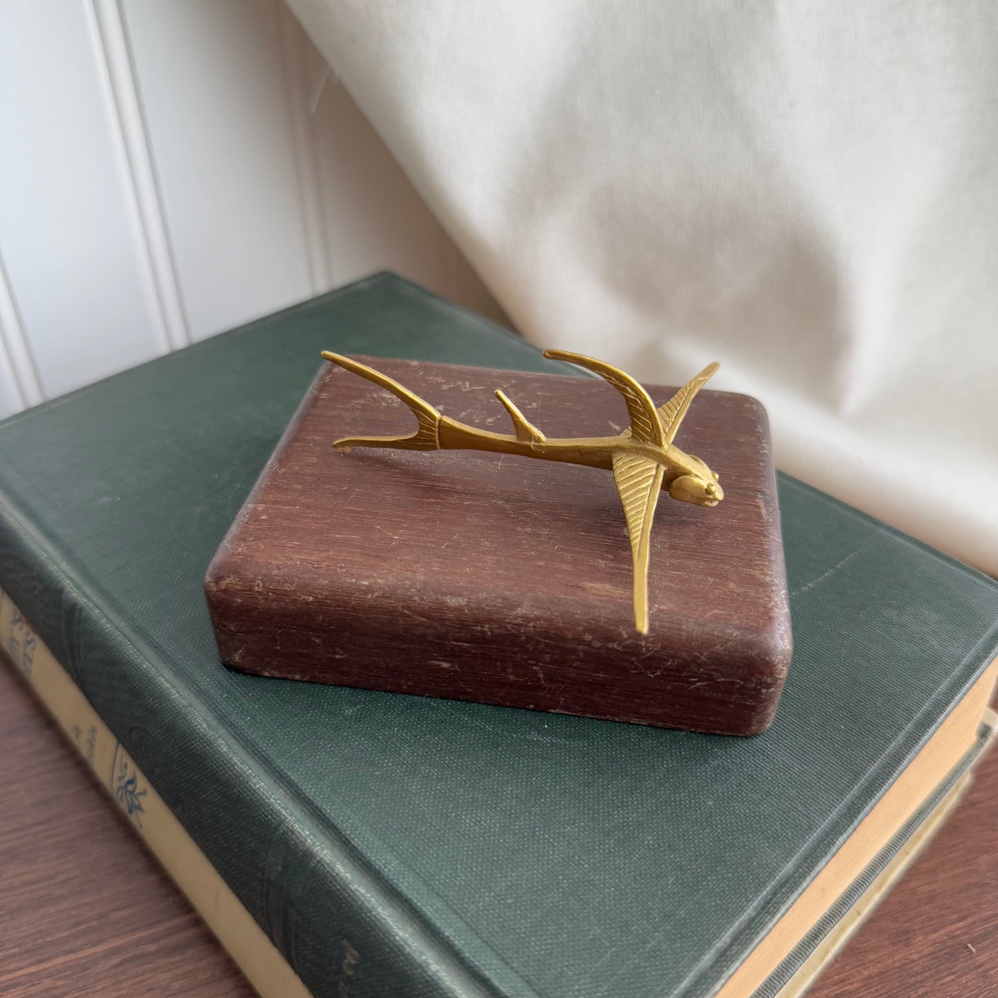 MCM Gold figurine on wood block