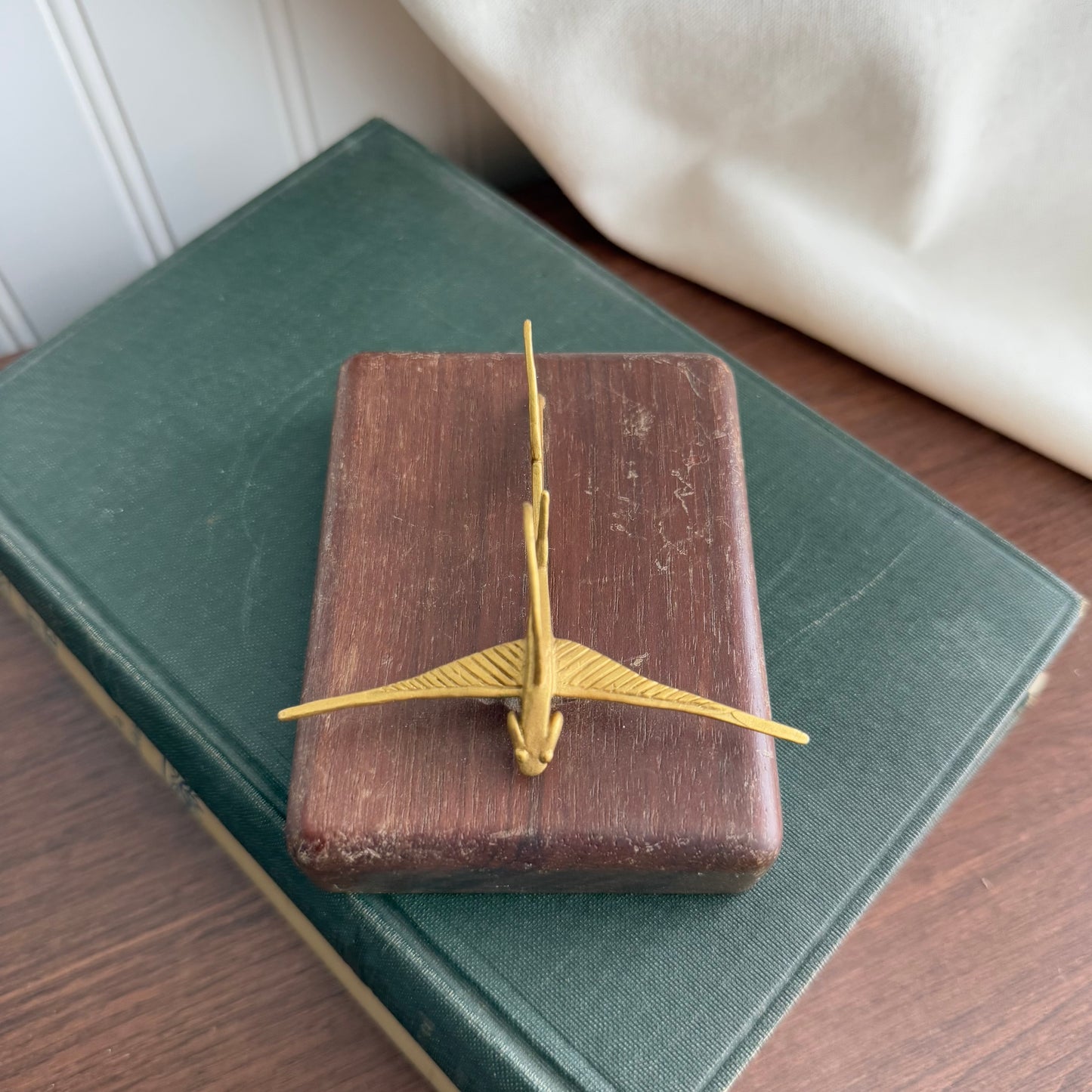 MCM Gold figurine on wood block