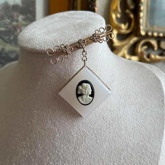 Vintage gold gilt wire dangling brooch with black and white Cameo