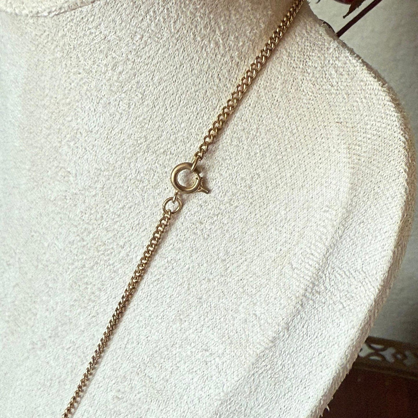 Vintage gold tone locket with glass faux amber Stone necklace