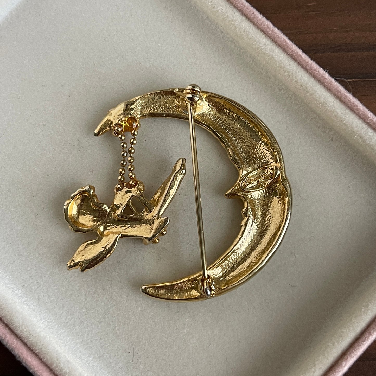 Vintage angel angel swinging from moon pin Signed Danecraft brooch