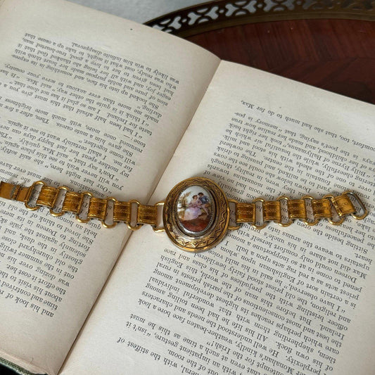 Vintage bookchain bracelet with an oval porcelain cameo in the center