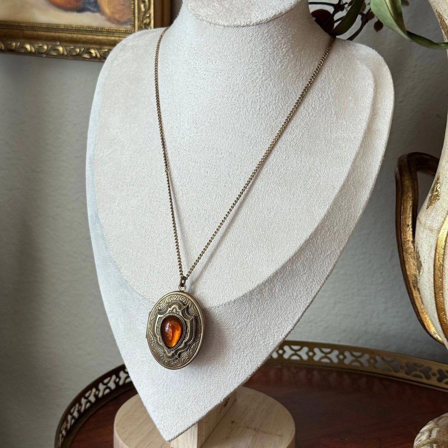 Vintage gold tone locket with glass faux amber Stone necklace