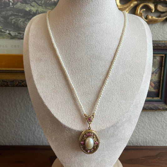 Vintage 1928 pearl necklace with locket with pink rhinestone