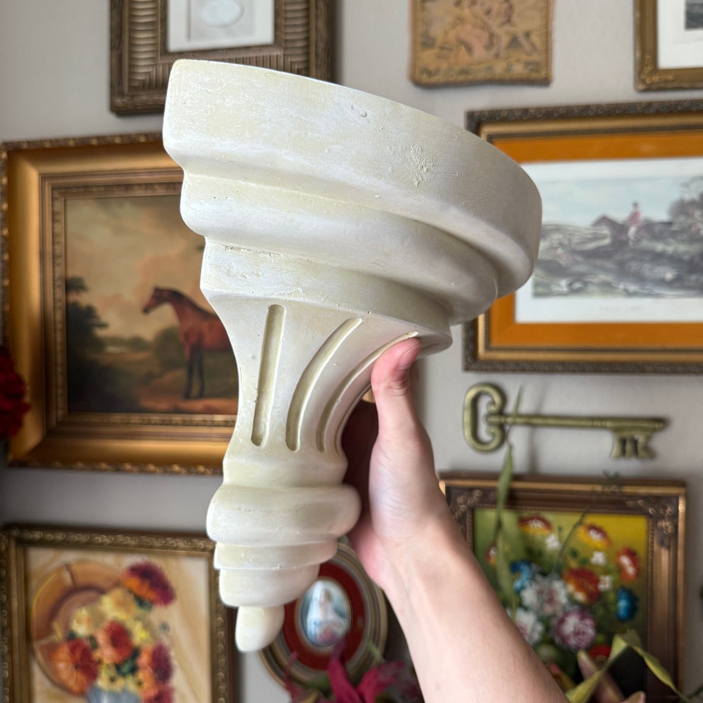 White curved wall sconce