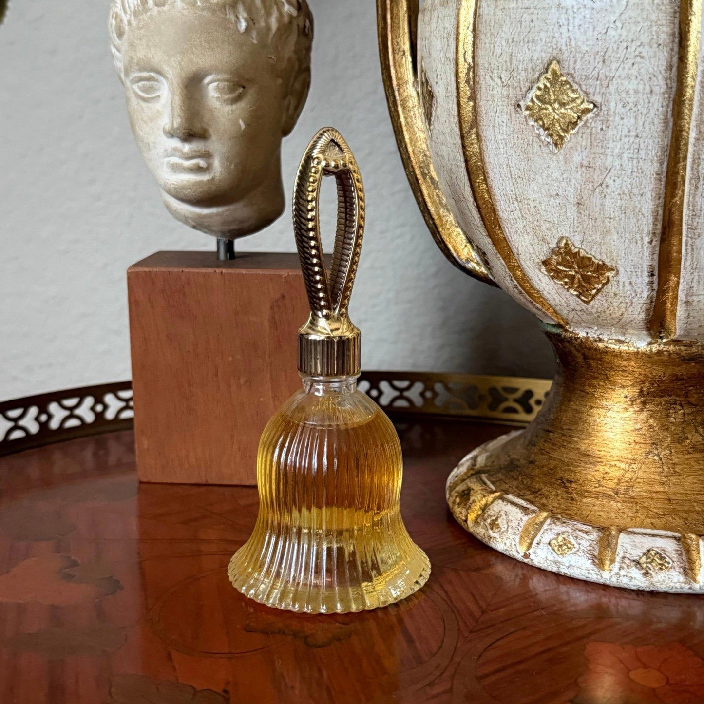 Avon "To a Wild Rose" Cologne in a bell-shaped bottle