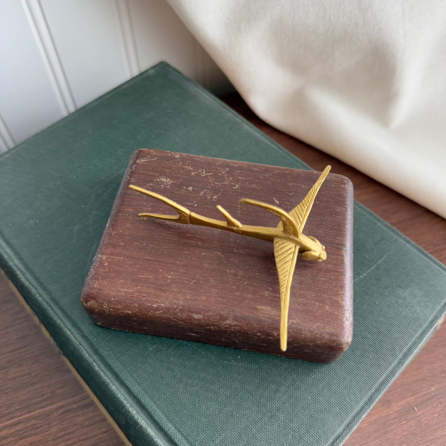 MCM Gold figurine on wood block