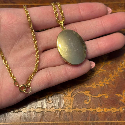 Vintage Sarah Coventry Oval gold locket