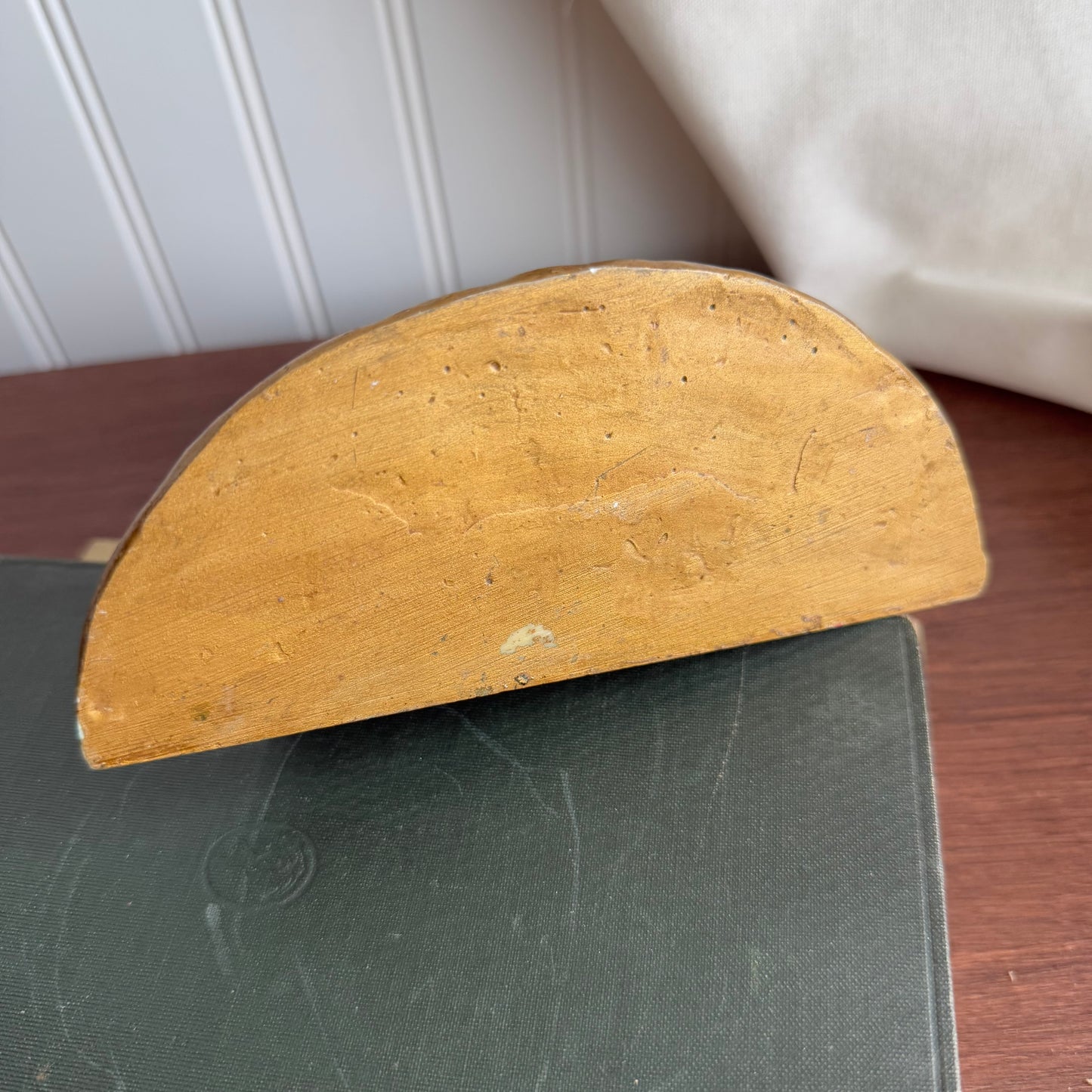 Gold tone wall shelf