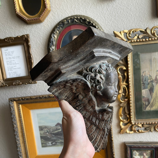 Vintage style cherub head plaster wall shelf
