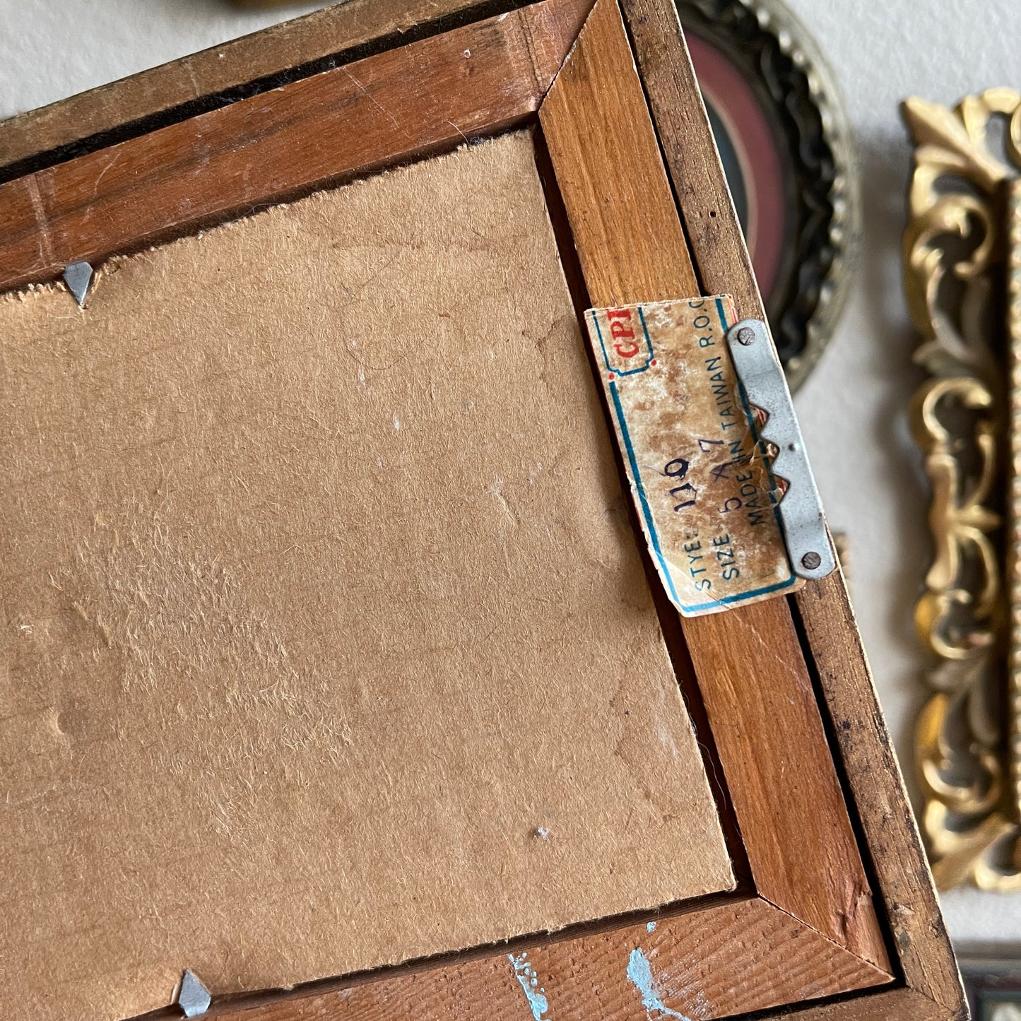 Vintage ocean painting in wooden bamboo style frame