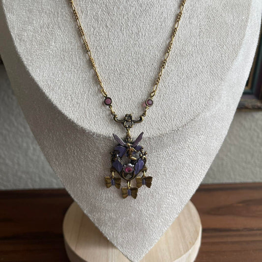Vintage style gold tone purple Fairy necklace