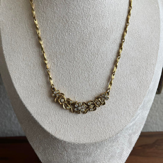 Vintage 1928 gold tone floral and rhinestone necklace