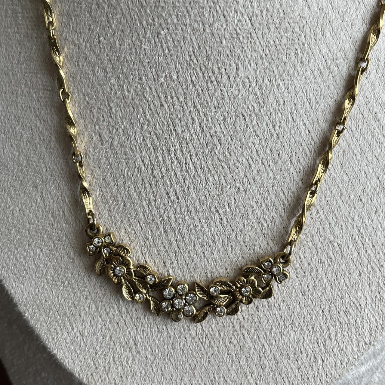 Vintage 1928 gold tone floral and rhinestone necklace