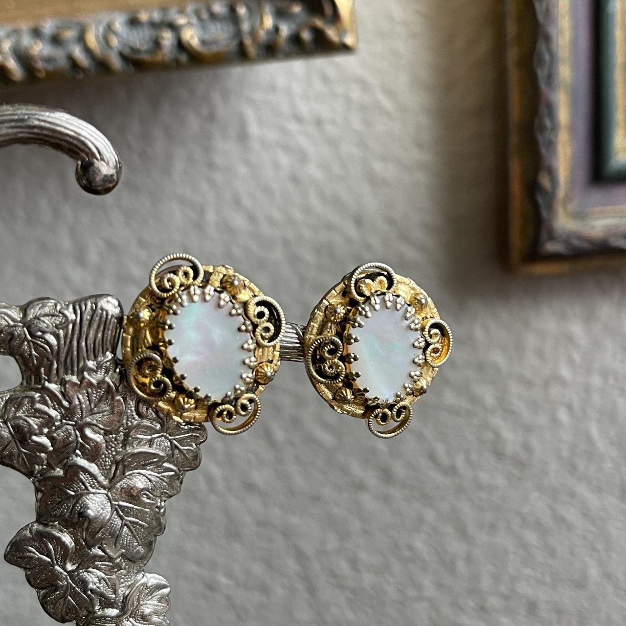 Vintage gold tone mother of pearl clip on earrings