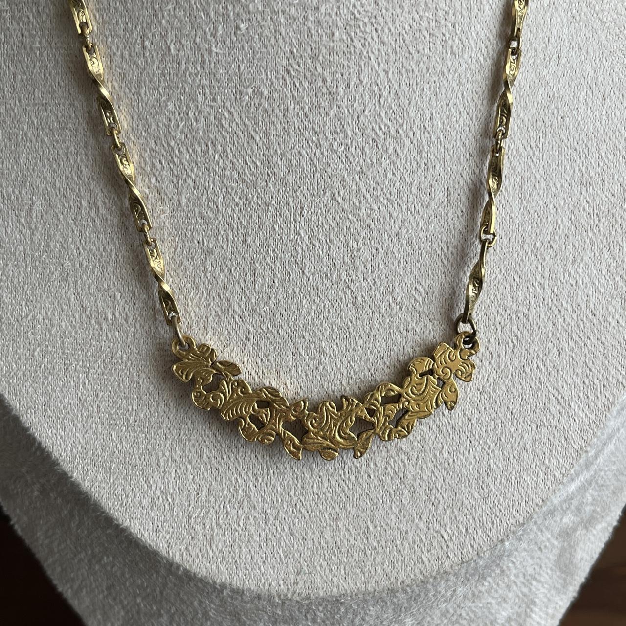 Vintage 1928 gold tone floral and rhinestone necklace