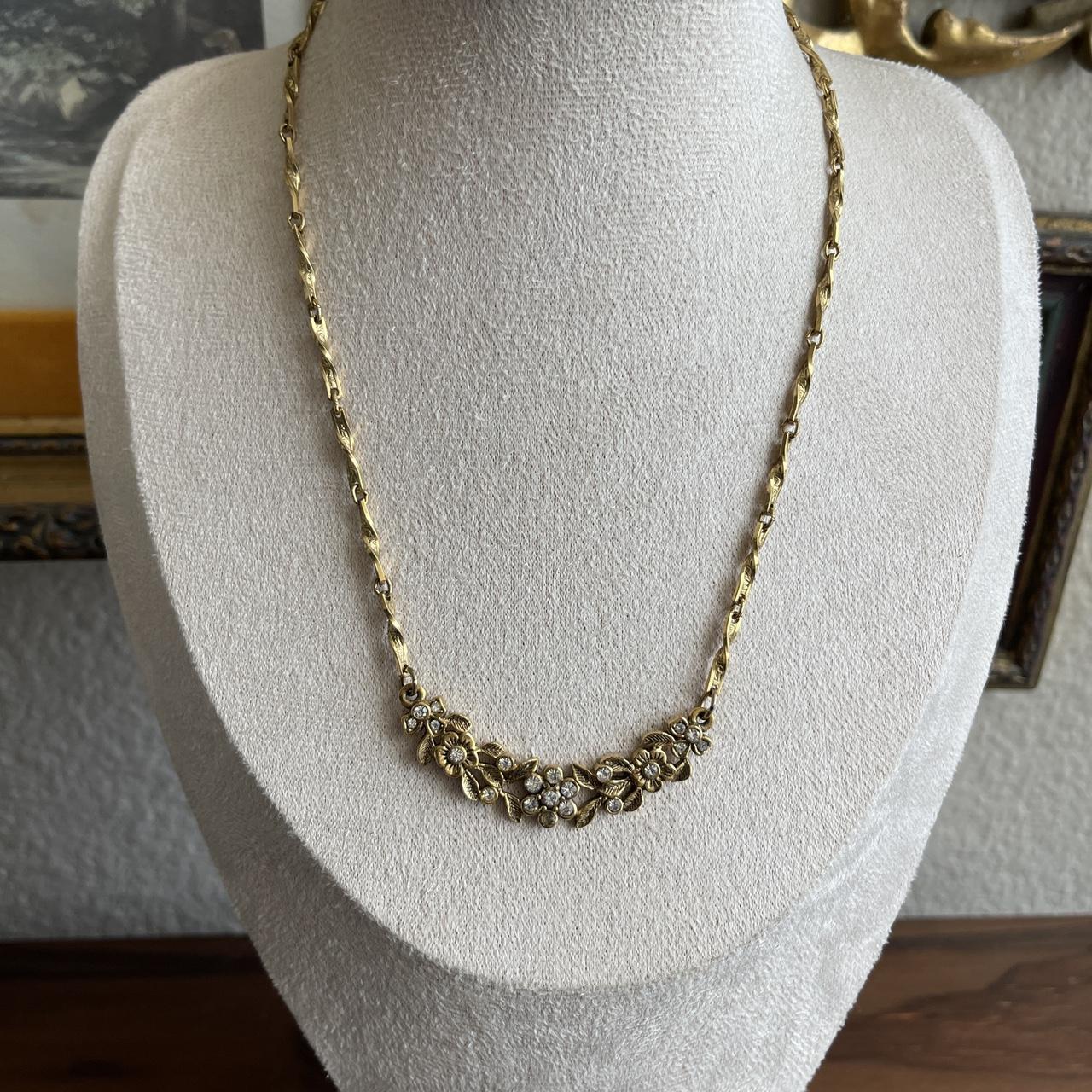 Vintage 1928 gold tone floral and rhinestone necklace