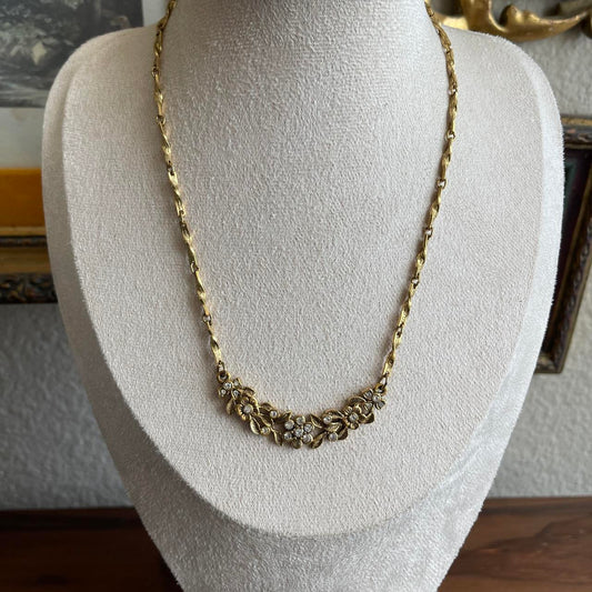 Vintage 1928 gold tone floral and rhinestone necklace