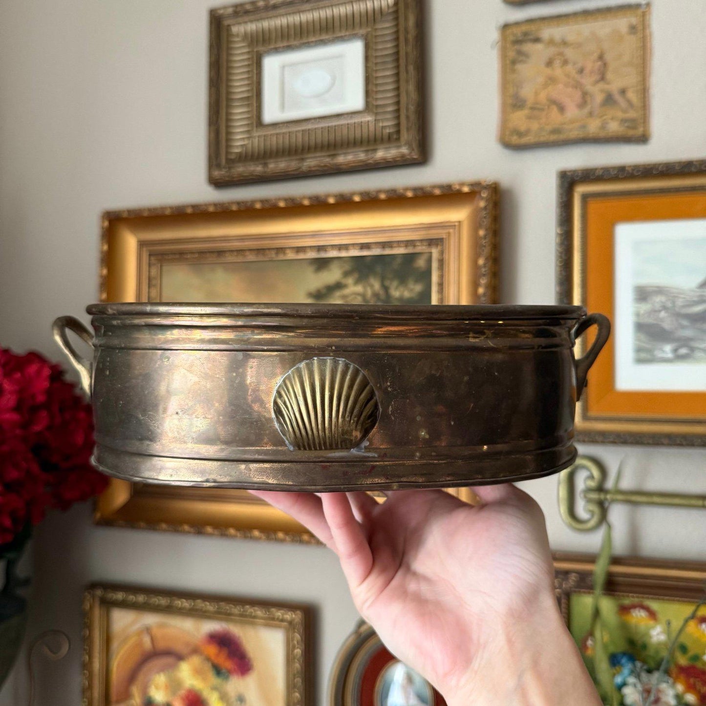 Vintage brass oval planter with a shell design