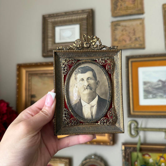 Vintage Portrait of a Man in Metal Frame