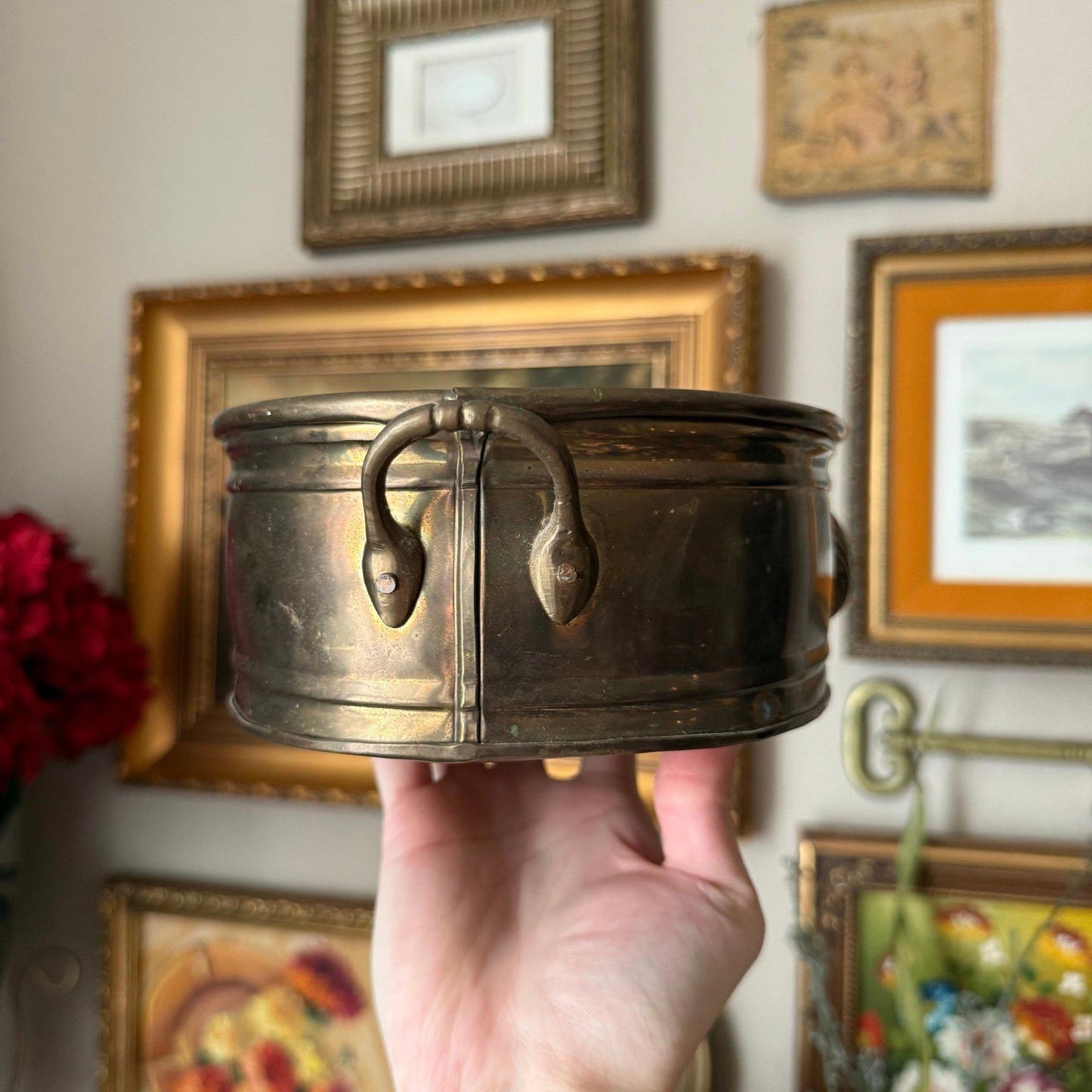 Vintage brass oval planter with a shell design