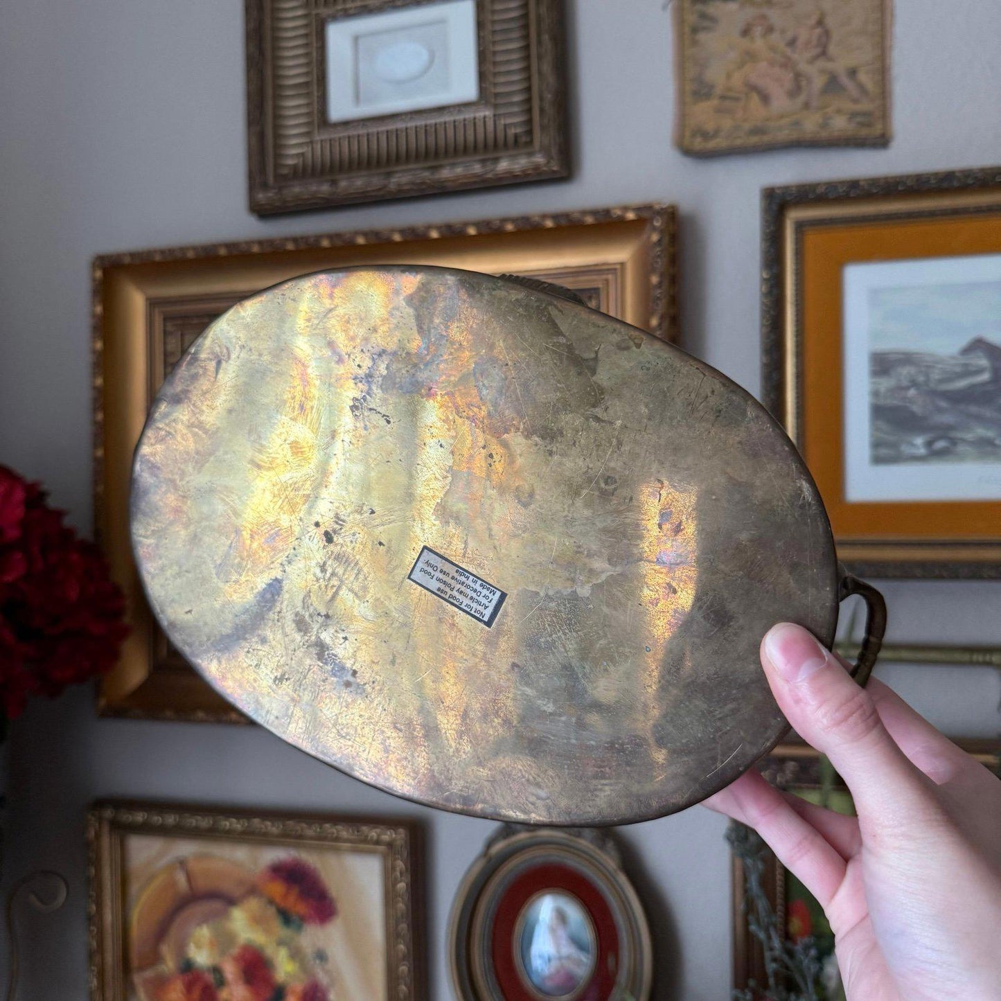 Vintage brass oval planter with a shell design