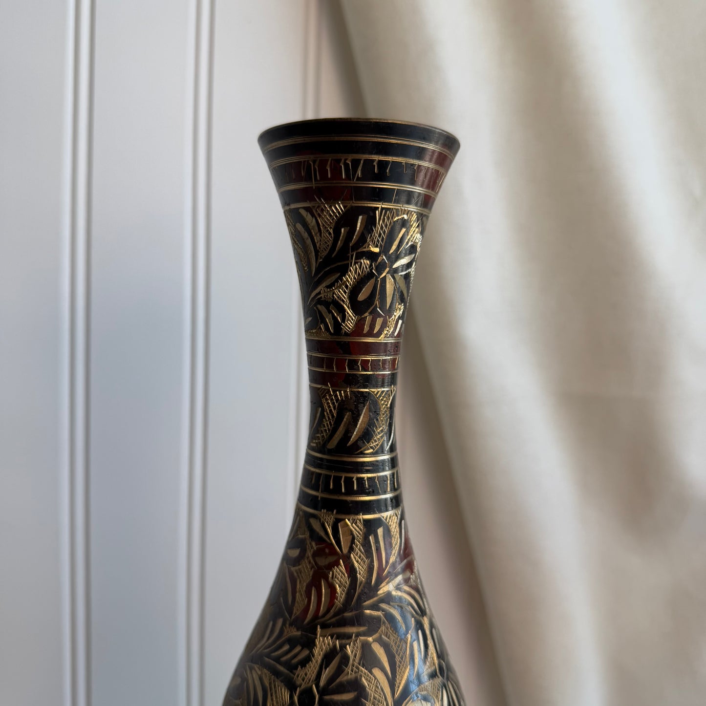 Brass vase with black etched details