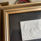 Gold Framed plaster intaglio with black textured background art work