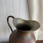 Vintage brass pitcher with etched details