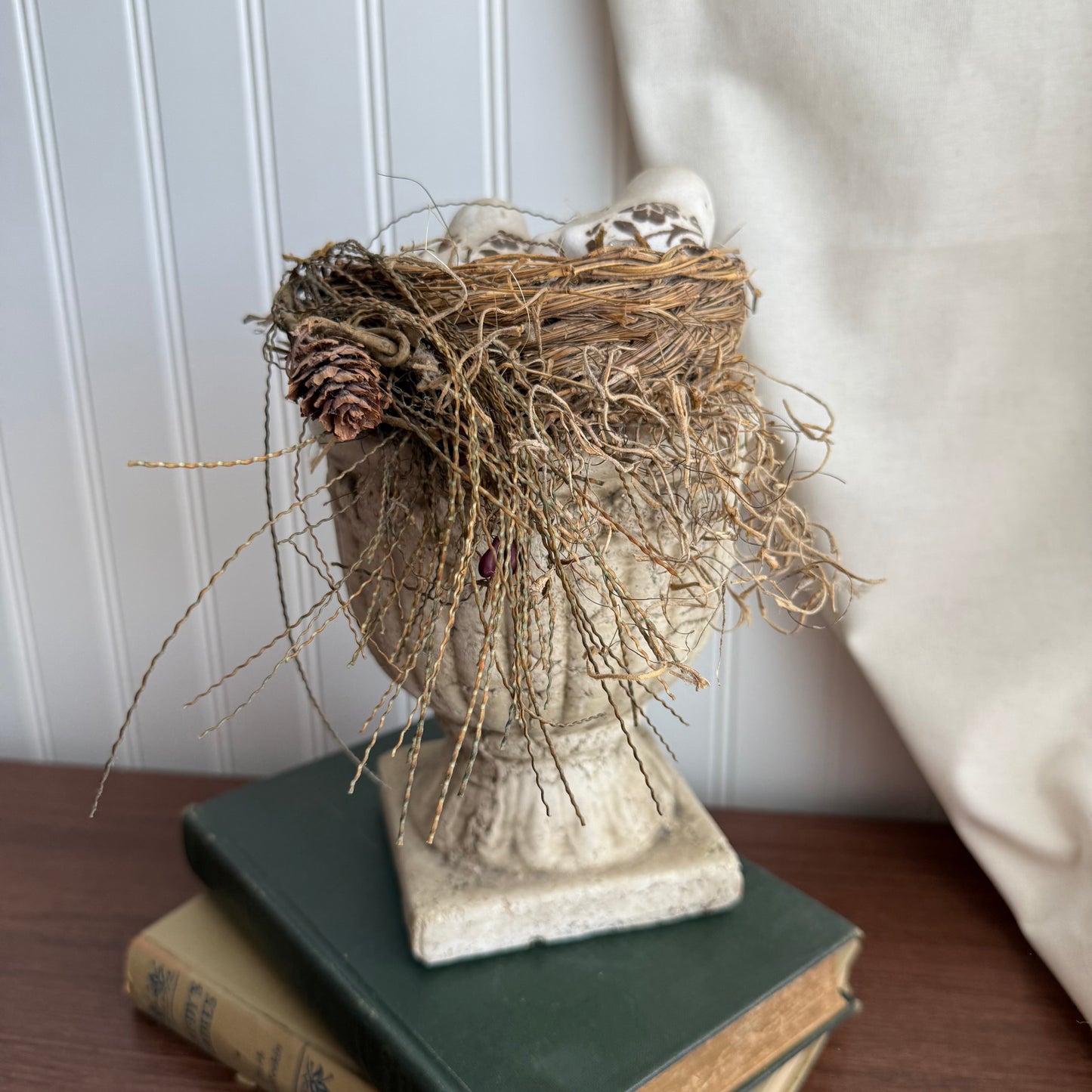 Bird nest on pedestal