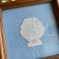 Vintage needlepoint clam art work