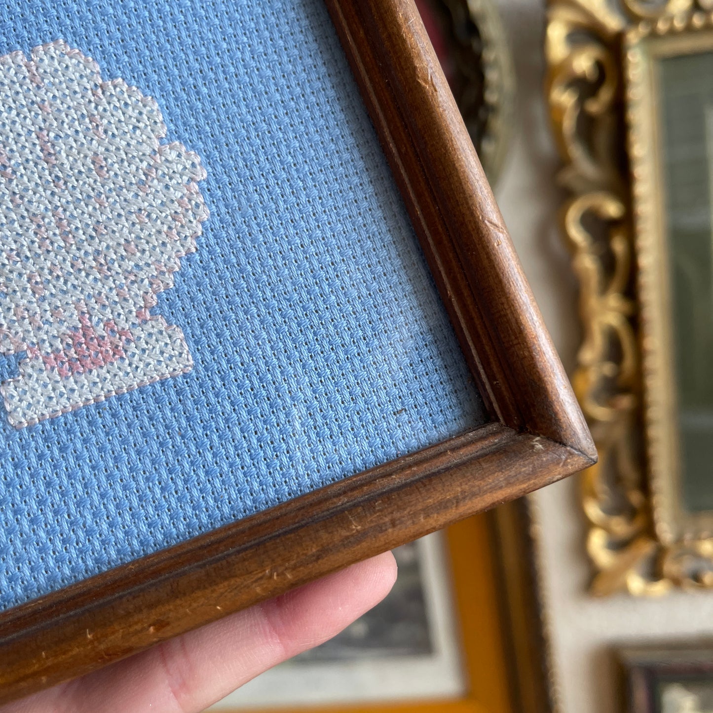 Vintage needlepoint clam art work