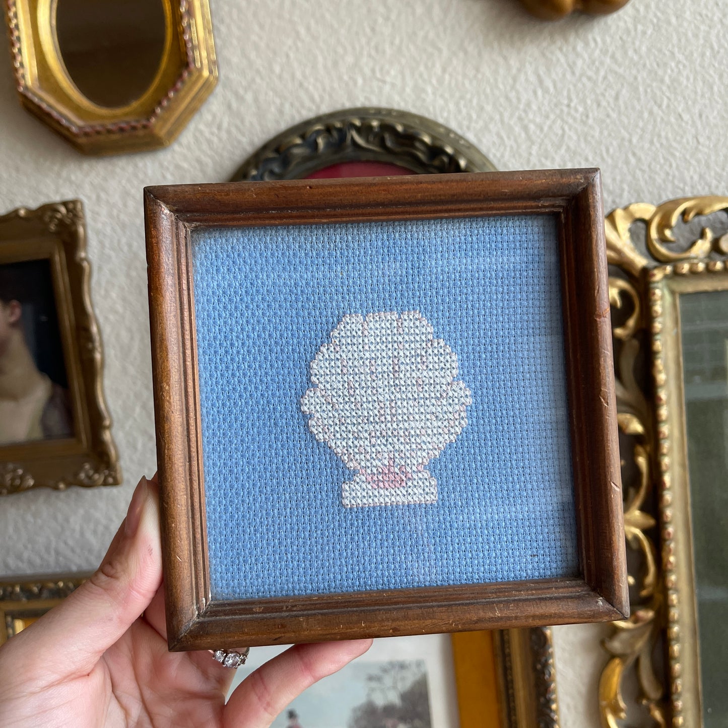 Vintage needlepoint clam art work