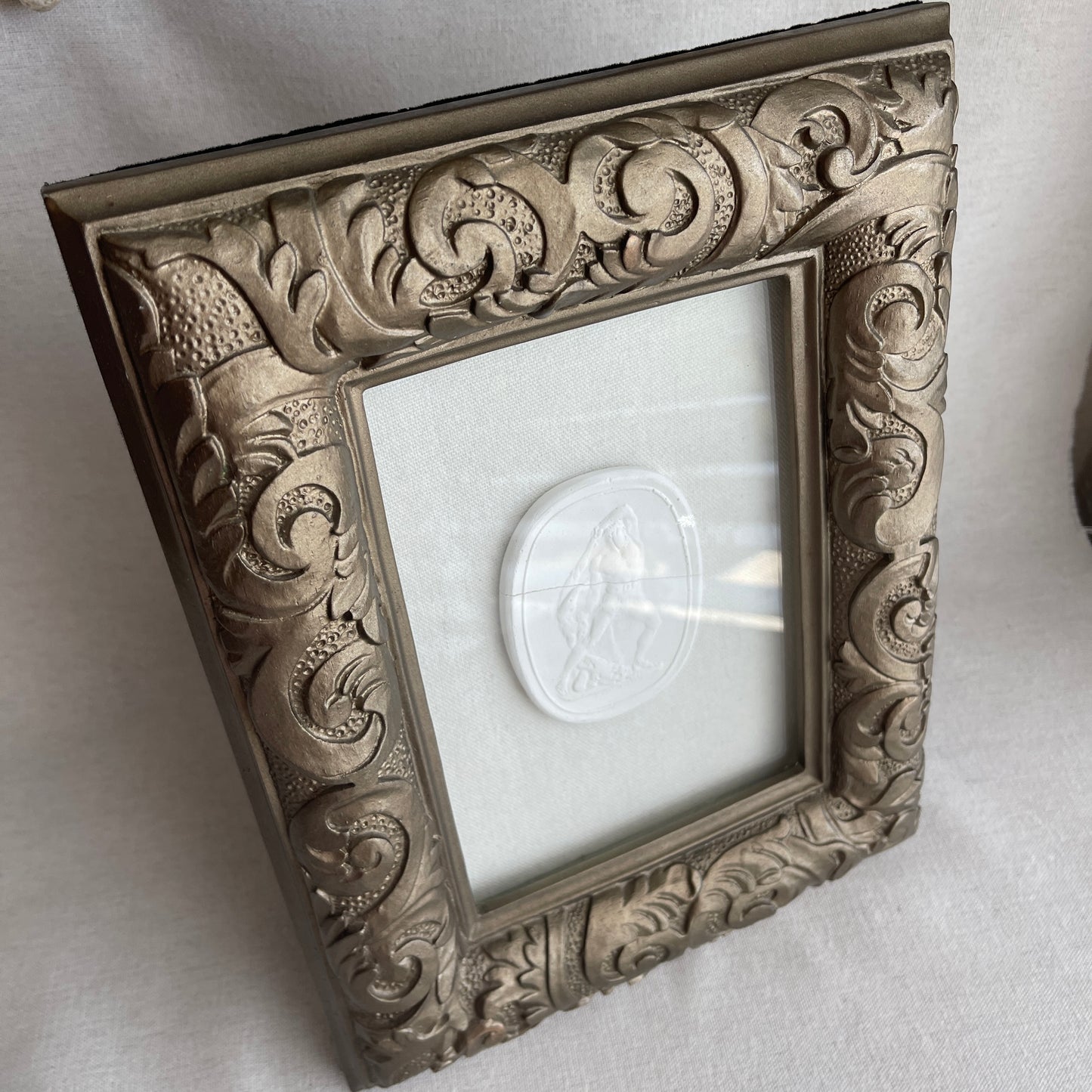 Vintage ornate plaster framed Intaglio