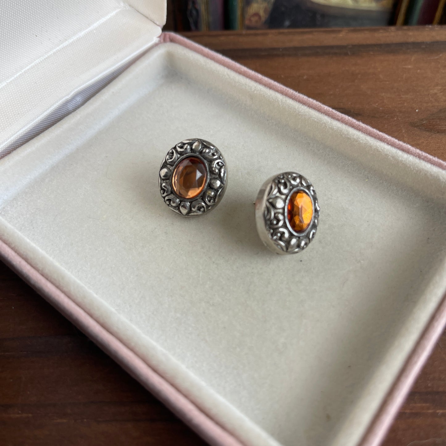 Vintage style silver tone oval orange stone earrings