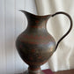 Vintage brass pitcher with etched details