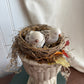 Bird nest on pedestal