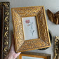 Gold Ornate leaf frame with flower print