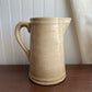 Cream pottery pitcher