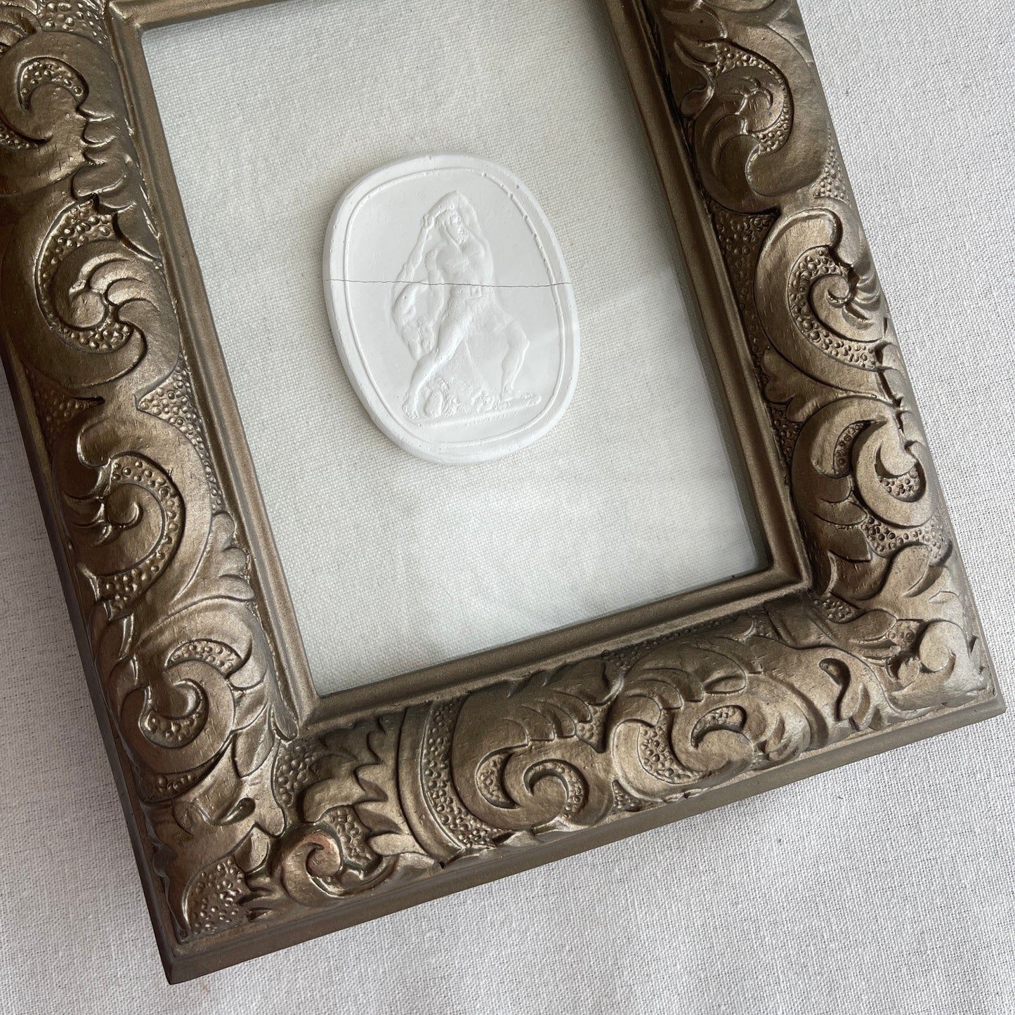 Vintage ornate plaster framed Intaglio