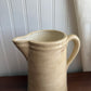 Cream pottery pitcher