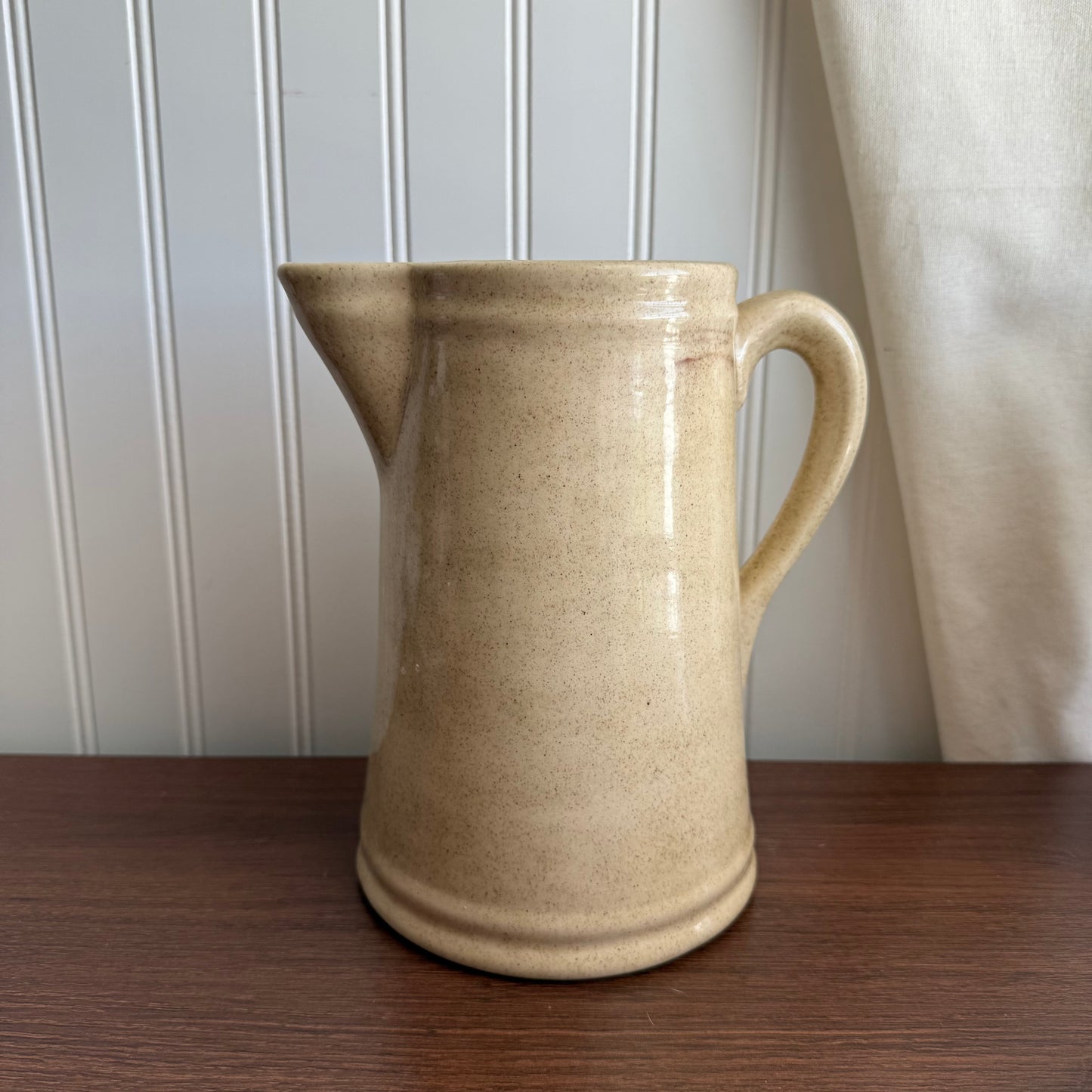 Cream pottery pitcher