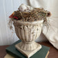 Bird nest on pedestal