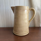 Cream pottery pitcher